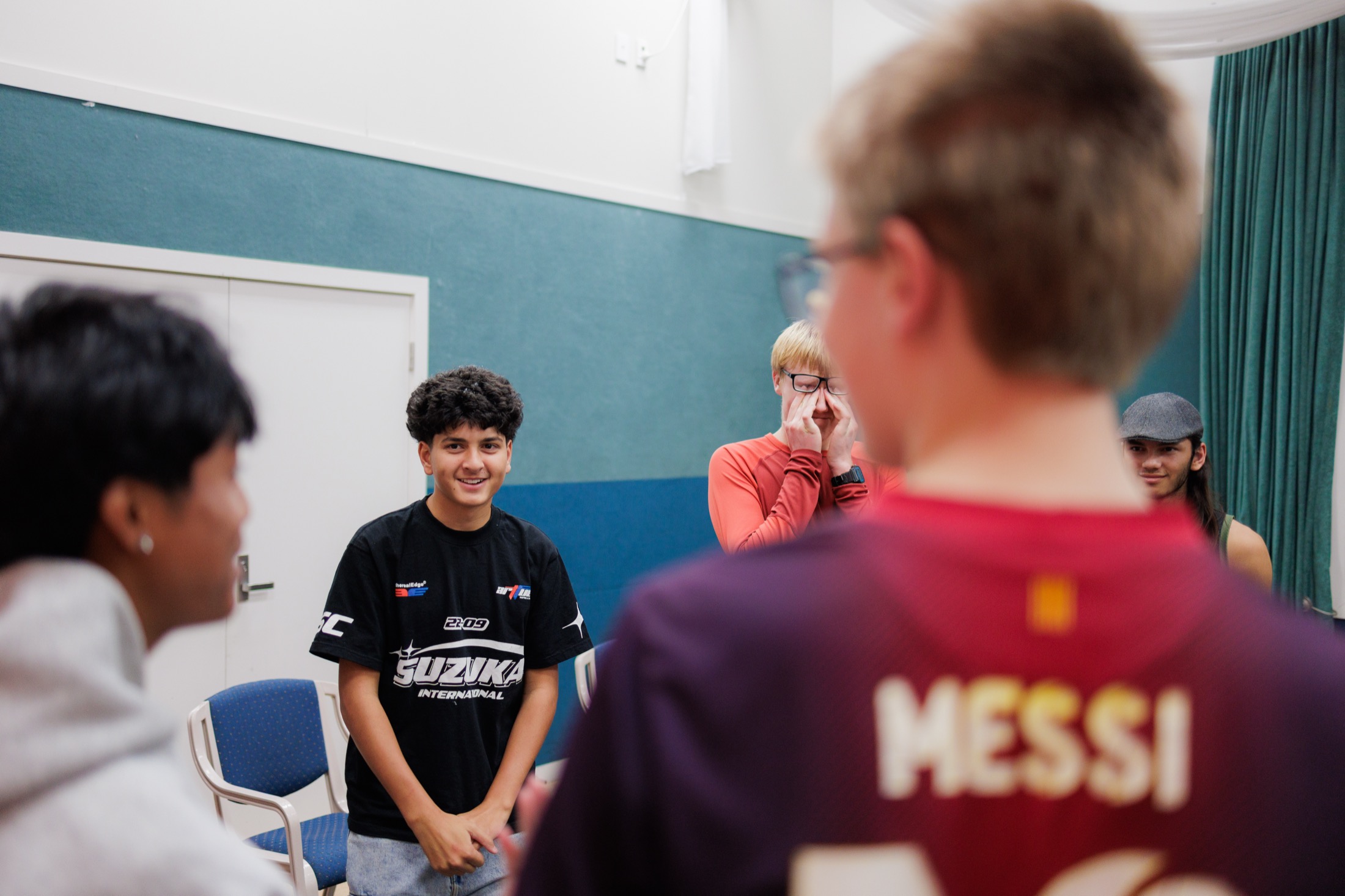A mentor and young people together